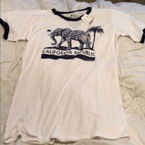 a never worn before white tee shirt